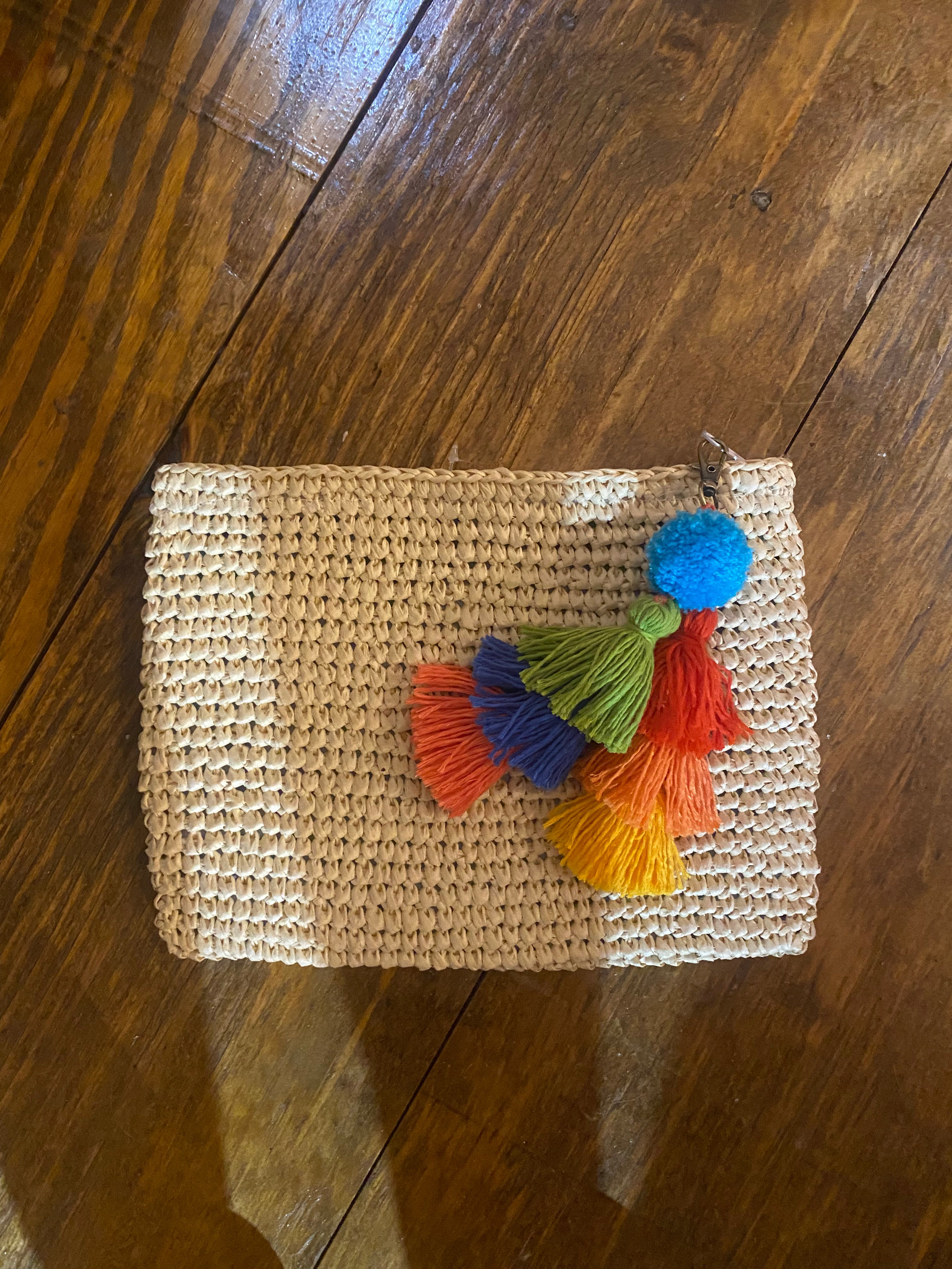 Straw clutch with charm