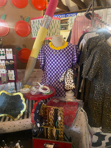 Purple and gold checkerboard shirt
