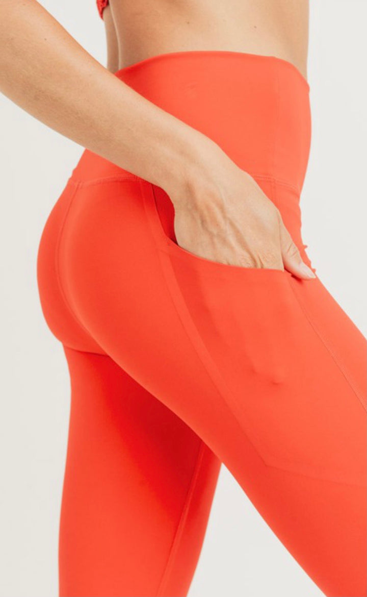Orange fold over high waist leggings